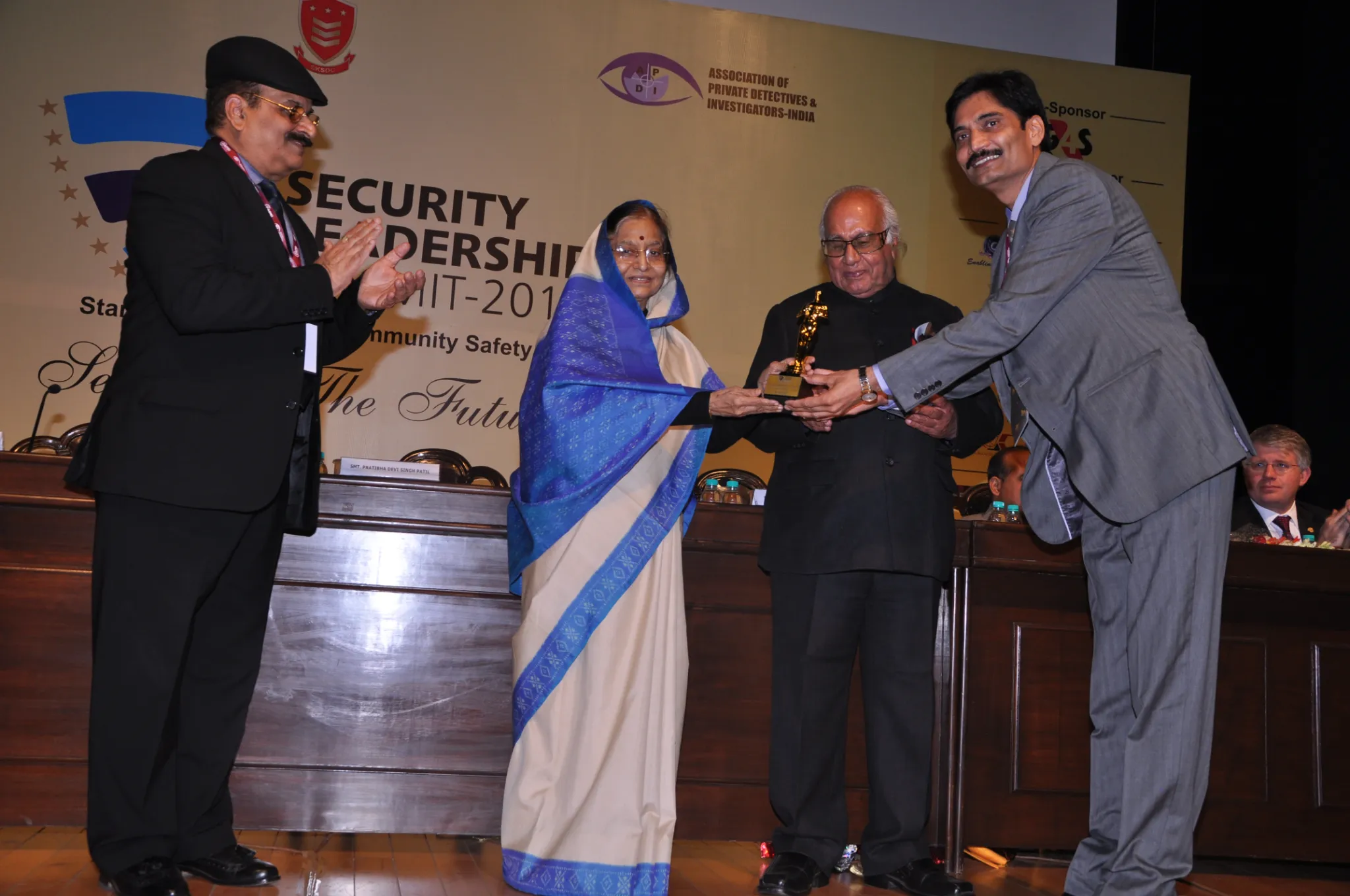 Hatfield representative receiving an award at a security leadership event